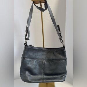 The SAK metallic silver faux leather purse